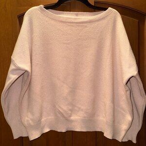 Off-the-shoulder blush sweater